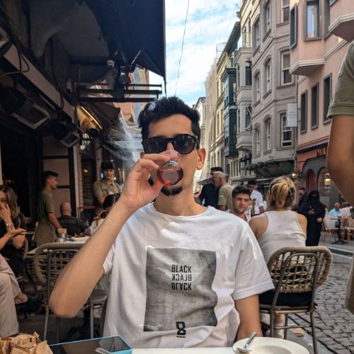 Ahmed Al-forjani, photographed at a street café